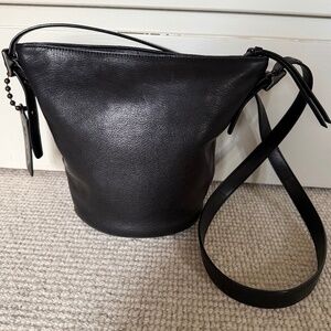 Coach Bleeker small mini duffle bag in black glove tanned leather. #D1481-32281.